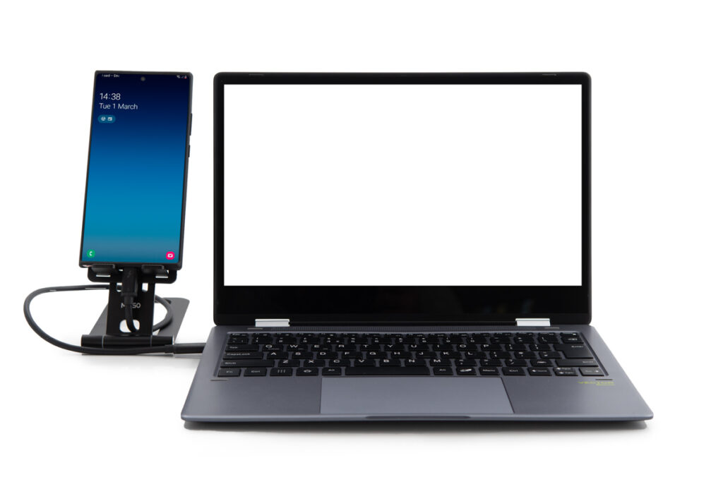 An image of a laptop linked up to a mobile phone