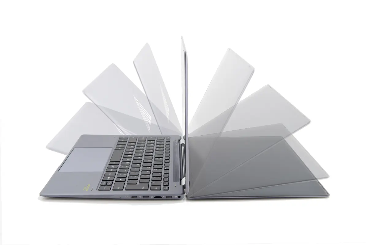A commercial product photo showing the flexibility of a laptop hinge