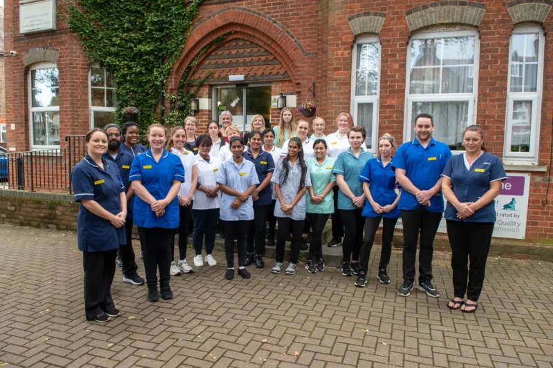 Team staff portrait taken at a care home in Horsham
