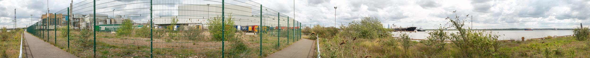 A landscape visual impact assessment photograph taken for my client looking towards the development site from the side of an existing warehouse structure