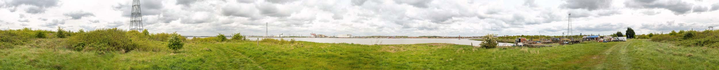 A landscape visual impact assessment photograph taken for my client looking towards the development site from across the river in a nature park