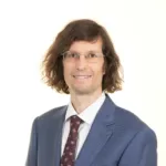 A staff website portrait taken for a man working in a Sussex Business